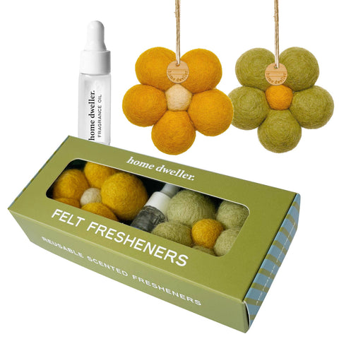 Wool bloom air freshener styled in a car interior — fresh outdoor scent