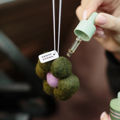 Yuzu, Lime & Coconut fragrance oil being applied to felt flower diffuser
