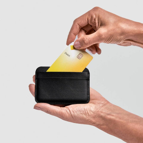 Black Card Holder with a card partially inserted