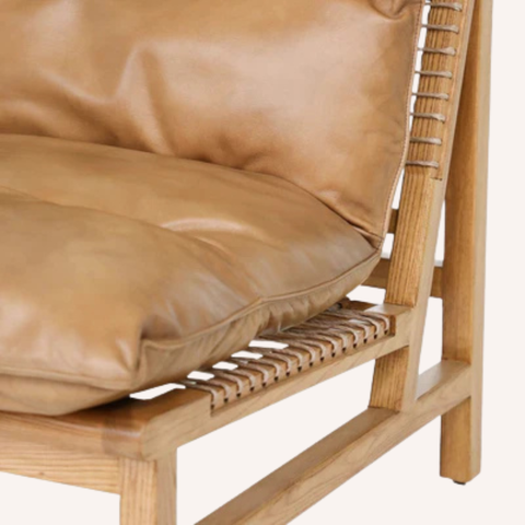 Close-up of hand-laced stitching and rope support detail on the Dex Side Chair frame