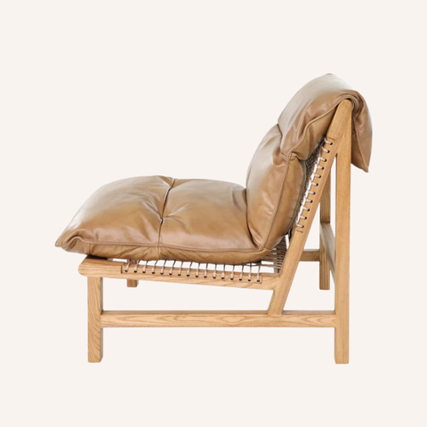 Dex Side Chair side profile showing hand-laced frame support and leather seat depth