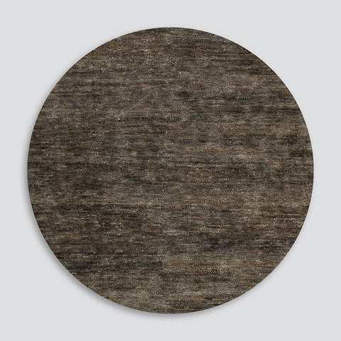 Full view of Fairbanks Fossil Round Rug in earthy fossil tone