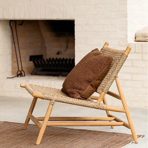 Piper Cushion in Tobacco styled indoors, showing the bouclé weave texture