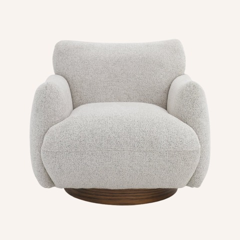 Relli Swivel Chair front profile showing pillow-like arms and deep cocooning seat