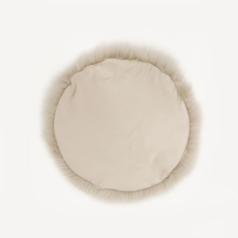 Sheepskin seat pad back view showing non-slip polyester base