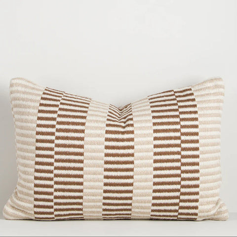 Sol Cushion in Terracotta with handwoven almond and terracotta offset linear design